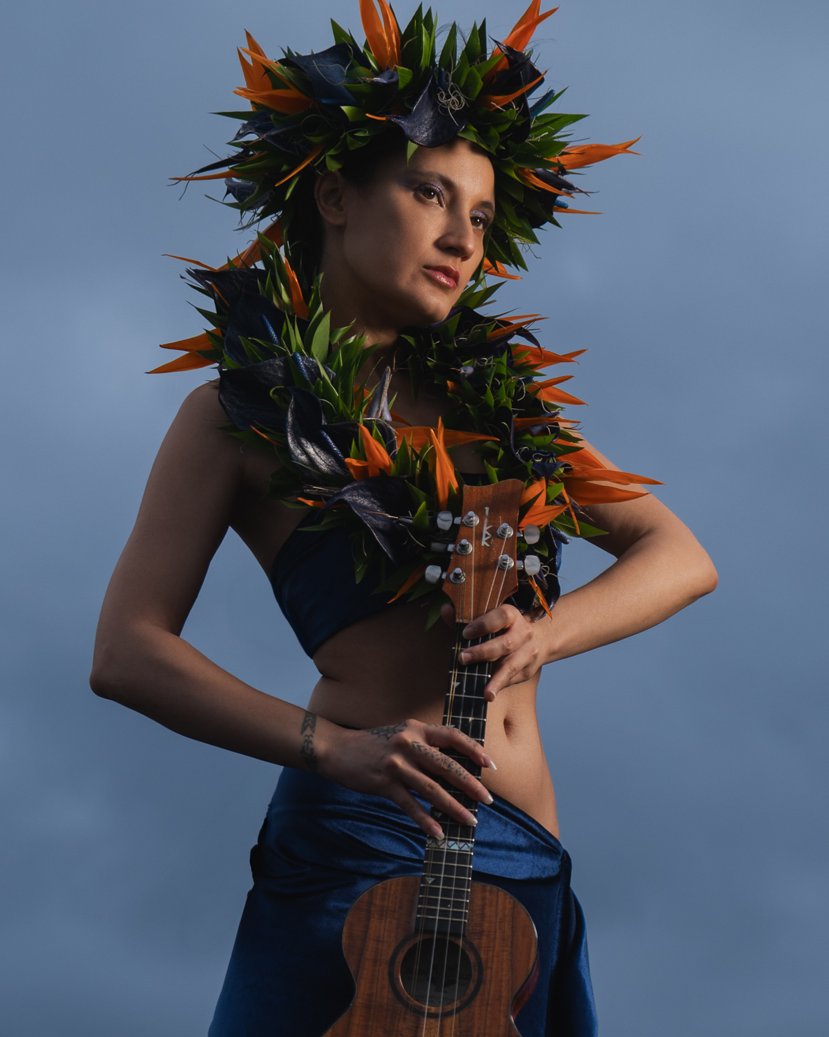 Taimane standing at twilight in Lanikai, Hawaii